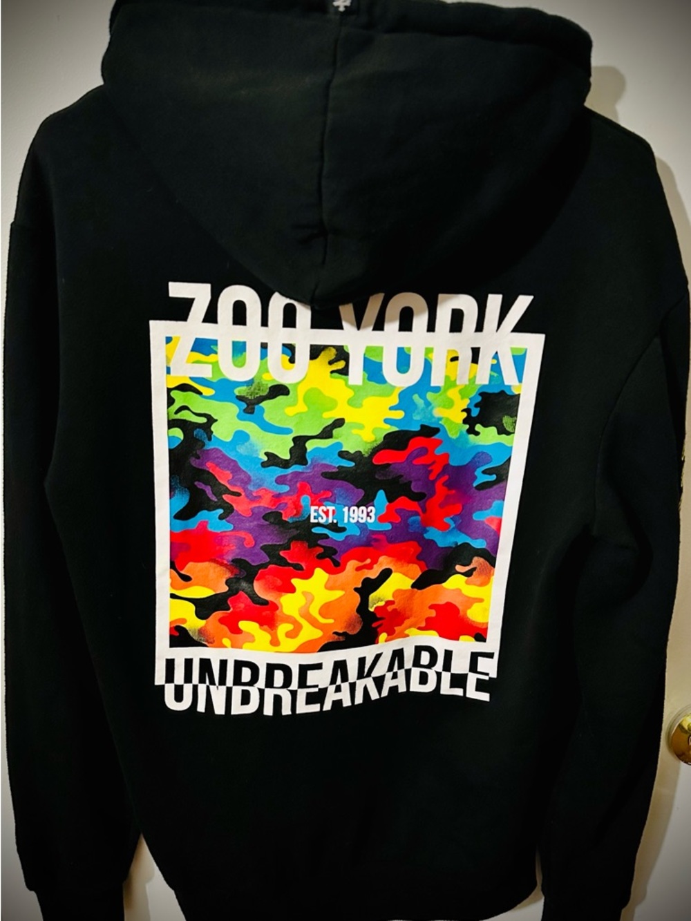 Zoo York Black Hoodie with Vibrant Multicolor Camo Back Print